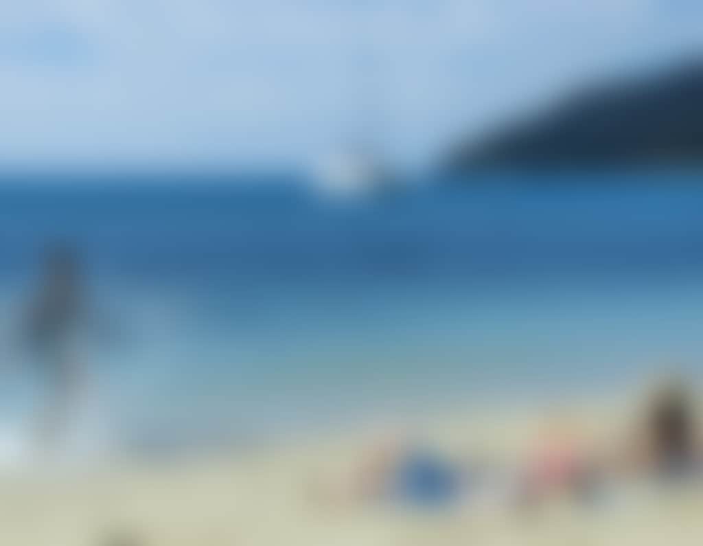 Bareboating Family On Beach